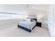 Bright bedroom with a bed, ceiling fan and loft area at 1699 N Downing St # 409, Denver, CO 80218