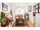 Elegant dining room with a chandelier and hardwood floors at 9770 Quitman Way, Westminster, CO 80031