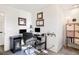 Well-lit home office featuring dual monitors, a rolling chair, and ample workspace at 9770 Quitman Way, Westminster, CO 80031