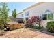 Spacious backyard with a brick path, garden, and deck with a hot tub creates a serene outdoor retreat at 633 W 114Th Way, Northglenn, CO 80234