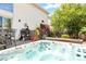 Outdoor deck features a hot tub and a built-in grill and bar space perfect for outdoor entertaining at 633 W 114Th Way, Northglenn, CO 80234