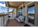 Charming balcony with seating, decorative pillows, and string lights, perfect for relaxing outdoors at 6001 Castlegate Dr # A33, Castle Rock, CO 80108