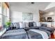 Comfortable living room featuring a large couch with plenty of seating and natural light at 6001 Castlegate Dr # A33, Castle Rock, CO 80108