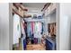 Organized walk-in closet with shelving and hanging space, showcasing ample storage at 6001 Castlegate Dr # A33, Castle Rock, CO 80108