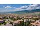 An aerial view shows this neighborhood with stunning mountain views and a community park at 2347 S Loveland St, Lakewood, CO 80228