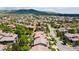 An aerial view shows this neighborhood with well-maintained homes, mature trees, and green spaces at 2347 S Loveland St, Lakewood, CO 80228