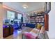 Cozy office space with custom built-in shelving, hardwood floors, and large windows at 2347 S Loveland St, Lakewood, CO 80228