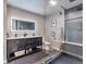 Modern bathroom showcasing a glass enclosed shower and a sleek vanity with illuminated mirror at 10695 Wynspire Rd, Highlands Ranch, CO 80130