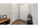 Clean and bright entryway with hardwood floors and storage at 9836 Mount Kataka Pt, Littleton, CO 80125