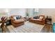 Comfortable living room area with a neutral rug and lots of seating at 9836 Mount Kataka Pt, Littleton, CO 80125