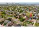 An aerial view of the neighborhood showcasing its proximity to the city, lush greenery, and well-maintained streets at 3731 N Race St, Denver, CO 80205
