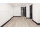 Spacious finished basement with wood vinyl flooring and recessed lighting at 3731 N Race St, Denver, CO 80205