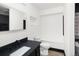 Modern bathroom with black countertop and vanity at 3731 N Race St, Denver, CO 80205