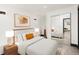 Bright bedroom with neutral decor, modern lighting, and stylish furniture at 3731 N Race St, Denver, CO 80205