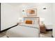 Bright bedroom with neutral decor, modern lighting, and stylish furniture at 3731 N Race St, Denver, CO 80205