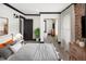 Stylish bedroom with brick accent wall, sliding mirror closet, and modern decor at 3731 N Race St, Denver, CO 80205