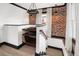 Cozy landing area with built-in shelves and stylish lighting at 3731 N Race St, Denver, CO 80205