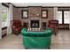 Charming living room featuring a brick fireplace and comfortable seating at 3731 N Race St, Denver, CO 80205