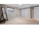 Bedroom featuring neutral walls, carpet floors, a window, and a closet at 17934 E Purdue Pl, Aurora, CO 80013