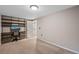 Bedroom featuring neutral walls, carpet floors, shelving, and a closet at 17934 E Purdue Pl, Aurora, CO 80013