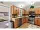 Well-equipped kitchen featuring stainless steel appliances, ample counter space, and a convenient layout at 17934 E Purdue Pl, Aurora, CO 80013