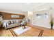 Bright and airy living room featuring hardwood floors, stylish decor, and a cozy seating area at 17934 E Purdue Pl, Aurora, CO 80013