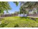 Spacious backyard with lush lawn and fire pit at 7930 Poplar St, Commerce City, CO 80022