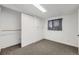 Cozy bedroom featuring carpeted flooring, closet and natural light at 7930 Poplar St, Commerce City, CO 80022