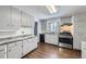 Functional kitchen with great floors, gray cabinets, stainless steel appliances, and ample counter space at 7930 Poplar St, Commerce City, CO 80022