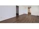 A spacious room with luxury vinyl flooring at 7930 Poplar St, Commerce City, CO 80022