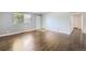 Bright and airy living room with hardwood floors, neutral paint, and a cozy atmosphere at 7930 Poplar St, Commerce City, CO 80022