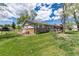 This home has a private patio area, a fenced yard, and a well manicured lawn at 10220 W Montgomery Ave, Littleton, CO 80127