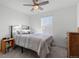 Cozy bedroom with a ceiling fan and ample natural light at 697 N Bersshine Ct, Watkins, CO 80137