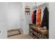 Inviting entryway with coat rack, shoe storage, and a decorative rug at 697 N Bersshine Ct, Watkins, CO 80137
