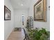 Bright entryway with wood-look floors and decorative accents at 697 N Bersshine Ct, Watkins, CO 80137