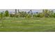 Panoramic view featuring city skyline, lush greenery, and a scenic golf course at 2539 N York St, Denver, CO 80205