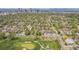 A neighborhood with the property located near a golf course, close to downtown, and surrounded by mature trees at 2539 N York St, Denver, CO 80205