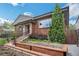 Beautifully landscaped front yard and exterior of home with a modern garden bed at 2539 N York St, Denver, CO 80205