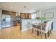 Well-appointed kitchen with stainless steel appliances and custom wood cabinetry at 2539 N York St, Denver, CO 80205