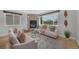 Cozy living room with a stone fireplace, comfortable seating, and large windows at 2539 N York St, Denver, CO 80205