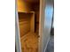 Walk-in closet with shelving and rod; carpeted flooring for clothes and shoes at 4764 S Duquesne St, Aurora, CO 80016