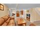 Basement featuring neutral walls, carpet, furniture, and a TV at 9411 La Quinta Way, Lone Tree, CO 80124