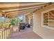 Charming deck featuring a seating area and awning, creating a comfortable outdoor space for relaxation and enjoyment at 9411 La Quinta Way, Lone Tree, CO 80124