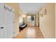 Entry hallway with hardwood floors and natural light is a cozy space at 9411 La Quinta Way, Lone Tree, CO 80124