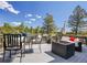 Enjoy outdoor living on the deck with mountain views, perfect for dining and relaxing, surrounded by natural beauty at 6574 Olympus Dr, Evergreen, CO 80439