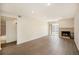 Bright living room with wood floors, fireplace and a sliding glass door to the outside at 865 S Quebec St # 103B, Denver, CO 80247