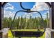Outdoor chairlift offering scenic forest views, perfect for enjoying the surrounding nature at 242 Point View Pl, Breckenridge, CO 80424