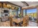 Dining area features a rustic table with a mountain view at 242 Point View Pl, Breckenridge, CO 80424