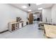 Spacious garage workshop featuring ample counter space and a connected garage area with various vehicles at 242 Point View Pl, Breckenridge, CO 80424