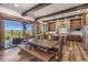 Gourmet kitchen with custom cabinets, granite countertops, and stainless steel appliances with scenic view at 242 Point View Pl, Breckenridge, CO 80424
